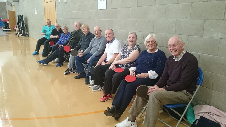 players waiting to play table tennis